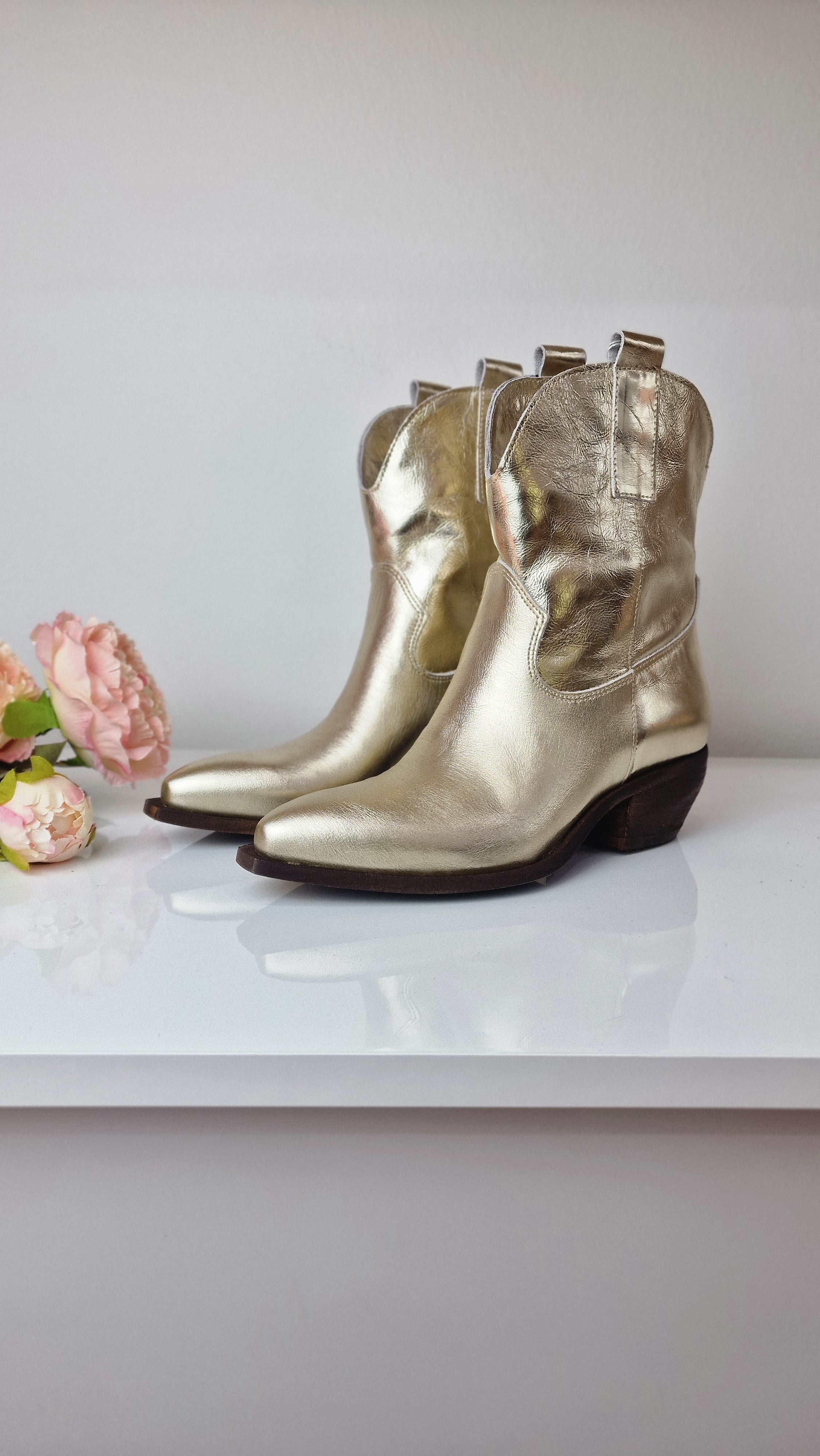 TEXANO in pelle laminata platino