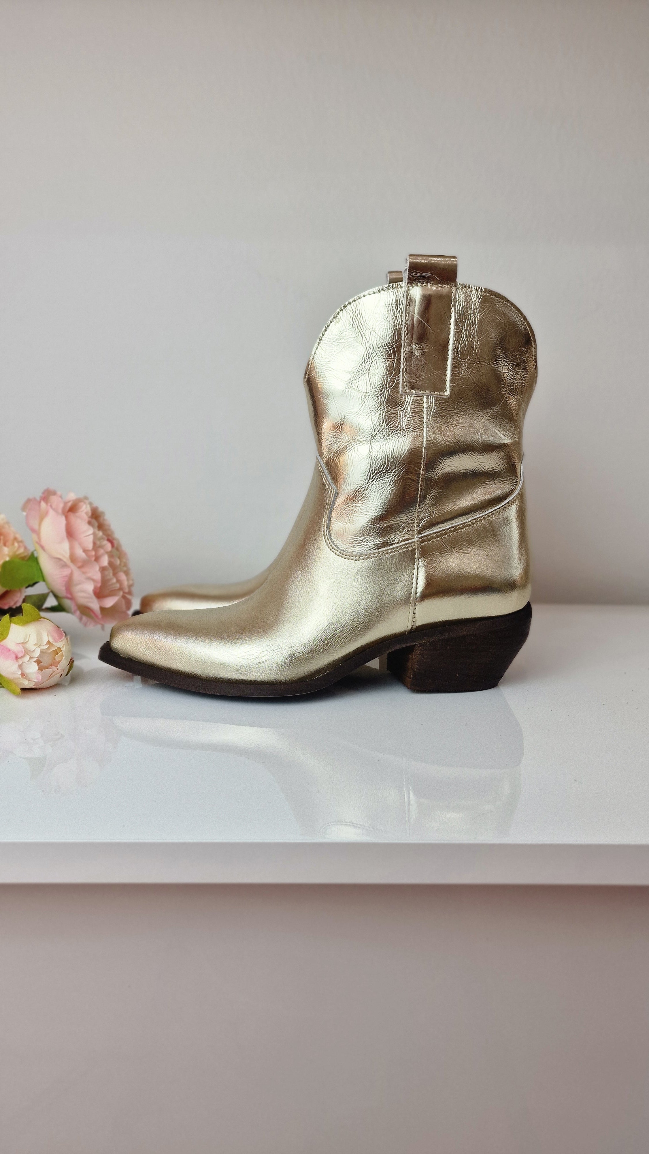 TEXANO in pelle laminata platino